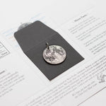 Fine silver double-sided full moon coin keychain - the perfect moon gift! Showing near side of the Moon.