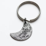 Fine silver double-sided crescent moon coin keychain - the perfect moon gift! Showing near side of the Moon.