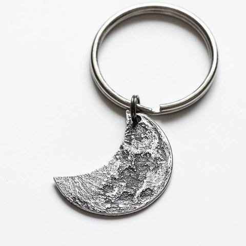 Fine silver double-sided crescent moon coin keychain - the perfect moon gift! Showing near side of the Moon.