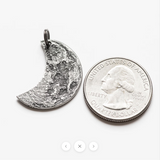 Fine silver double-sided crescent moon coin pendant necklace - the perfect moon gift! Showing near side of the Moon with size comparison.