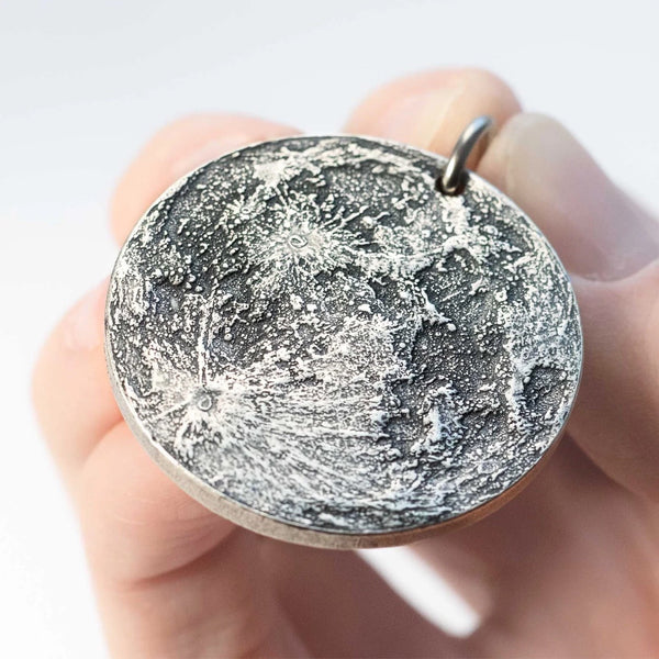 Fine silver double-sided supermoon full moon coin keychain - the perfect moon gift! Showing near side of the Moon.