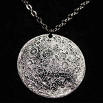 Fine silver double-sided supermoon full moon coin pendant necklace - the perfect moon gift! Showing far side of the Moon with black chain.