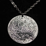 Fine silver double-sided supermoon full moon coin pendant necklace - the perfect moon gift! Showing far side of the Moon with black chain.